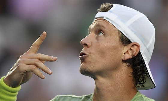 Tomá Berdych ve tvrtfinále Australian Open s Rogerem Federerem.