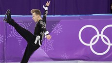 Český krasobruslař Michal Březina v krátkém programu v olympijském závodě. Český krasobruslař Michal Březina v krátkém programu v olympijském závodě.