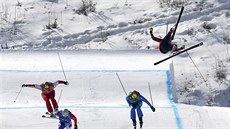 Christopher Del Bosco of Canada, right, flies through the air before crashing... Christopher Del Bosco of Canada, right, flies through the air before crashing...