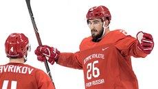 Střelec první ruské branky Vjačeslav Vojnov (vpravo) v olympijském finále proti... Střelec první ruské branky Vjačeslav Vojnov (vpravo) v olympijském finále proti...