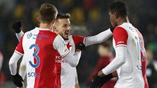 Slávisté Eduard Sobol (vlevo), Jakub Hromada a Simon Deli se radují v derby z... Slávisté Eduard Sobol (vlevo), Jakub Hromada a Simon Deli se radují v derby z...