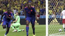 Střelec kolumbijské branky Yerry Mina (vpravo) slaví. Střelec kolumbijské branky Yerry Mina (vpravo) slaví.