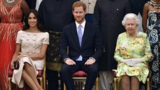 Vévodkyně Meghan, princ Harry a královna Alžběta II. na udílení ocenění Queen's... Vévodkyně Meghan, princ Harry a královna Alžběta II. na udílení ocenění Queen's...