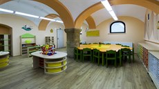 Družina vznikla v prostoru s klenutými stropy a krásnými sloupy. Družina vznikla v prostoru s klenutými stropy a krásnými sloupy.
