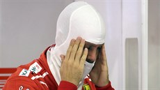 Německý jezdec Sebastian Vettel ze stáje Ferrari. Německý jezdec Sebastian Vettel ze stáje Ferrari.