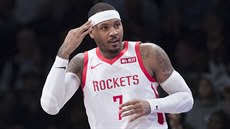 Carmelo Anthony (7) z Houstonu oslavuje svou trefu. Carmelo Anthony (7) z Houstonu oslavuje svou trefu.