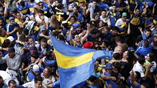 Fanoušci fotbalistů Boca Juniors se radují z gólu. Fanoušci fotbalistů Boca Juniors se radují z gólu.