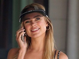 Kimberley Garner looks ready for the beach as she wears a black bikini with low...