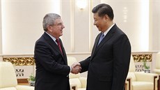 Šéf Mezinárodního olympijského výboru Thomas Bach (vlevo) na setkání se Si... Šéf Mezinárodního olympijského výboru Thomas Bach (vlevo) na setkání se Si...