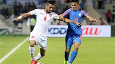 Bahrajnský fotbalista Mohamad Marhún (vlevo) v dresu národního týmu. Bahrajnský fotbalista Mohamad Marhún (vlevo) v dresu národního týmu.