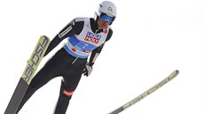 Český sdruženář Tomáš Portyk během skoku v rámci závodu dvojic na mistrovství... Český sdruženář Tomáš Portyk během skoku v rámci závodu dvojic na mistrovství...
