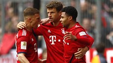 Fotbalisté Bayernu Mnichov oslavují gól: zprava jsou Serge Gnabry, Thomas... Fotbalisté Bayernu Mnichov oslavují gól: zprava jsou Serge Gnabry, Thomas...
