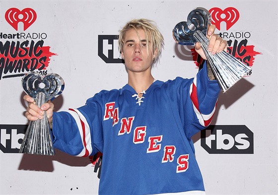 poses in the press room during the iHeartRadio Music Awards at The Forum on April 3, 2016 in Inglewood, California.