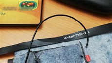 Elektronické zařízení, které používal muž při zkouškách na taxikáře. Elektronické zařízení, které používal muž při zkouškách na taxikáře.