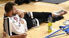 Martin Kříž z Nymburka si ve třetím zápase s Olomouckem vážně poranil... Martin Kříž z Nymburka si ve třetím zápase s Olomouckem vážně poranil...
