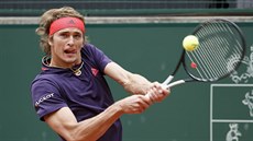 Němec Alexander Zverev odehrává balon během tenisového turnaje v Ženevě. Němec Alexander Zverev odehrává balon během tenisového turnaje v Ženevě.