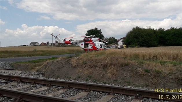 Pi srce vlaku s osobnm autem u Nan na Plzesku se vn zranili dva mui. (18. ervence 2019)