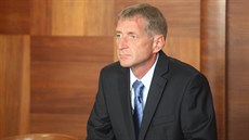 Roman Janouek ped jednáním u Vrchního soudu v Praze (16. záí 2014)