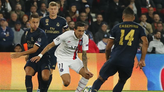 Ángel Di María (PSG) se prodírá přesilou hráčů Realu Madrid. Ángel Di María (PSG) se prodírá přesilou hráčů Realu Madrid.