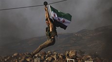 Tureckem podporovaní bojovníci Svobodné syrské armády se pipravují na tureckou...
