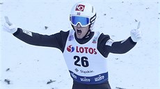 Daniel-André Tande z Norska se raduje z vítězství v závodě Světového poháru ve... Daniel-André Tande z Norska se raduje z vítězství v závodě Světového poháru ve...