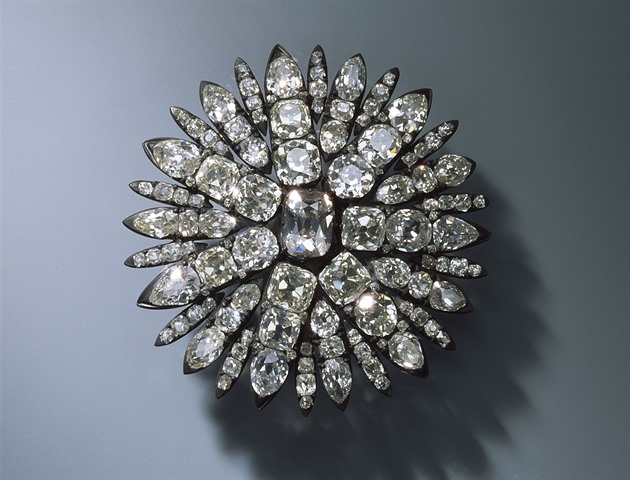 Dámská ozdoba ve tvaru slunce do vlas se 127 diamanty