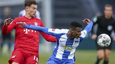 Leon Goretzka (vlevo) z Bayernu Mnichov v souboji s Javairem Dilrosunem z... Leon Goretzka (vlevo) z Bayernu Mnichov v souboji s Javairem Dilrosunem z...