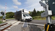 Železniční přejezd na silnici I/19 mezi Novým Městem na Moravě a Bystřicí nad... Železniční přejezd na silnici I/19 mezi Novým Městem na Moravě a Bystřicí nad...
