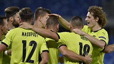 Čeští fotbalisté se radují z gólu, který Slovákům vstřelil Vladimír Coufal. Čeští fotbalisté se radují z gólu, který Slovákům vstřelil Vladimír Coufal.