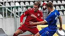 Ladislav Mužík (v červeném) v akci. Ladislav Mužík (v červeném) v akci.