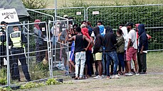 Migranti v litevském táboe pro uprchlíky. Do Litvy z Bloruska míí davy...