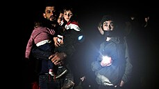 Migranti zadržení po překročení bělorusko-lotyšské hranice. (11. srpna 2021) Migranti zadržení po překročení bělorusko-lotyšské hranice. (11. srpna 2021)