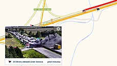 Návěs kamionu začal hořet po poledni na 226. km D1 ve směru na Brno, u sjezdu... Návěs kamionu začal hořet po poledni na 226. km D1 ve směru na Brno, u sjezdu...