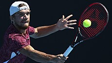Tomáš Macháč se soustředí na úder na Australian Open. Tomáš Macháč se soustředí na úder na Australian Open.