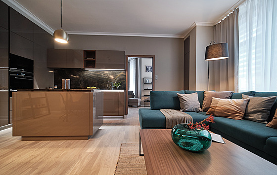 Obývací pokoj je spojený s kuchyským koutem a jídelnou.