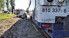 Dopravní nehoda auta a vlaku na elezniním pejezdu u Touimi. (12. ervence...