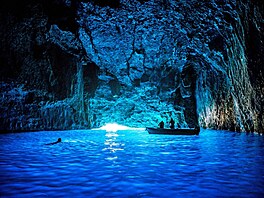 - (PICTURED: A diver swims near the boat inside a cave in Kas, Turkey.) - These...