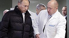 Jevgenij Prigoin (vpravo) na snímku s Vladimirem Putinem.