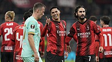 Tijjani Reijnders (uprosted) z AC Milán slaví svj gól proti Slavii.