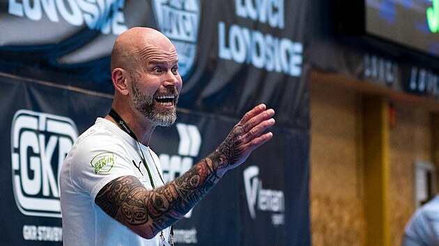 Lovci Lovosice - Baník Karviná, 2. zápas semifinále play off. Lovci slaví vítězství. Michal Brůna, trenér Karviné.