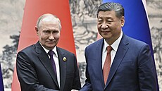 Ruský prezident Vladimir Putin a jeho ínský protjek Si in-pching v Pekingu....