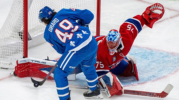 Jakub Dobeš (75) z Montreal Canadiens zastavuje v zápase s Colorado Avalanche pokus Samuela Girarda (49).