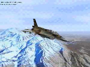 F-16 nad zasnenmi horami