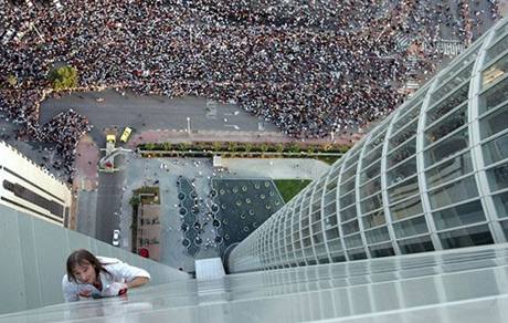 Pavouí mu Alain Robert v Singapuru