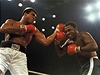 Muhammad Ali a Joe Frazier (vpravo)
