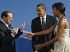Berlusconiho grimasy jsou povstn. Co ho napadlo, kdy ml podat ruku prvn dm USA, nen jist. Barack Obama nicmn vypad, e pi pedstavovn sv eny ekal od premira jinou reakci.