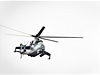 Bojový vrtulník Mi-24 podporuje raketami a kulometem jednotky na zemi.