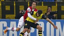 Fotbalista Arsenalu Tomáš Rosický a Sokratis Papastathopulos z Dortmundu | na serveru Lidovky.cz | aktuální zprávy