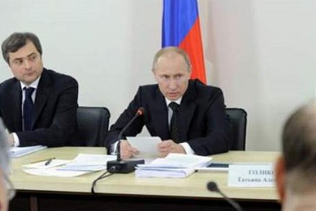 The Kremlins chief ideologist Vladislav Surkov (left) is said to have had authority even over presidents Vladimir Putin (center) and Dmitri Medvedev