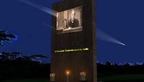 According to the artist’s ‘outdoor cinema’ conception, pictures of Czechoslovaks who lived in exile would be projected onto a large wall made of artificial sandstone According to the artist’s ‘outdoor cinema’ conception, pictures of Czechoslovaks who lived in exile would be projected onto a large wall made of artificial sandstone